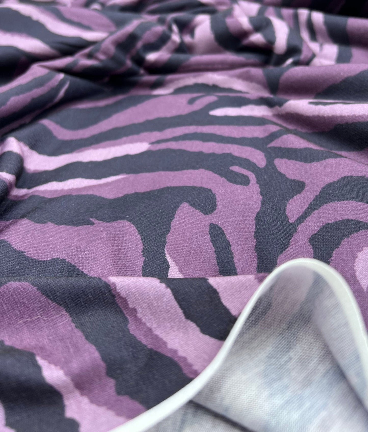 Purple Zebra Spun Poly Stretch Fabric