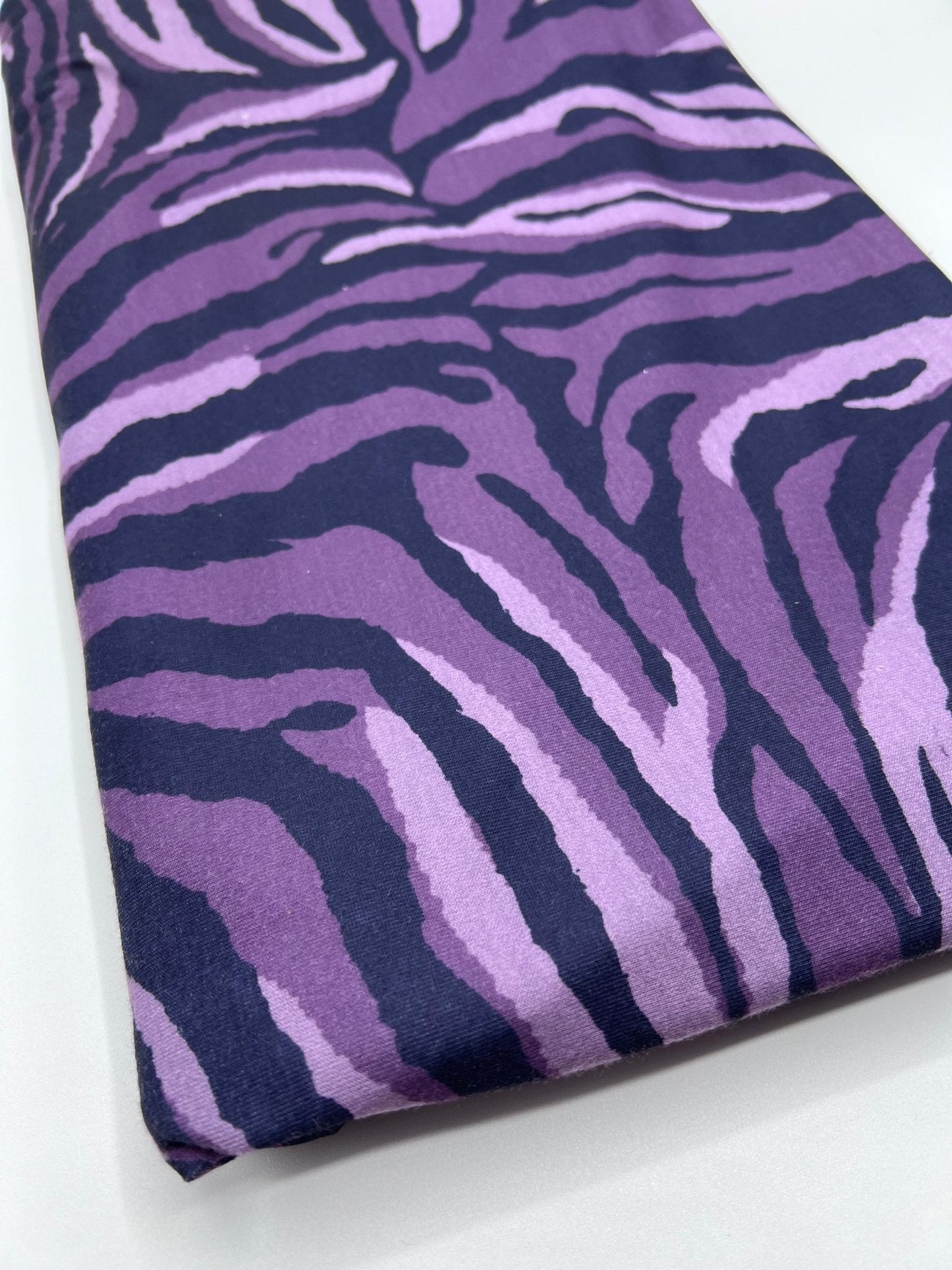 Purple Zebra Spun Poly Stretch Fabric