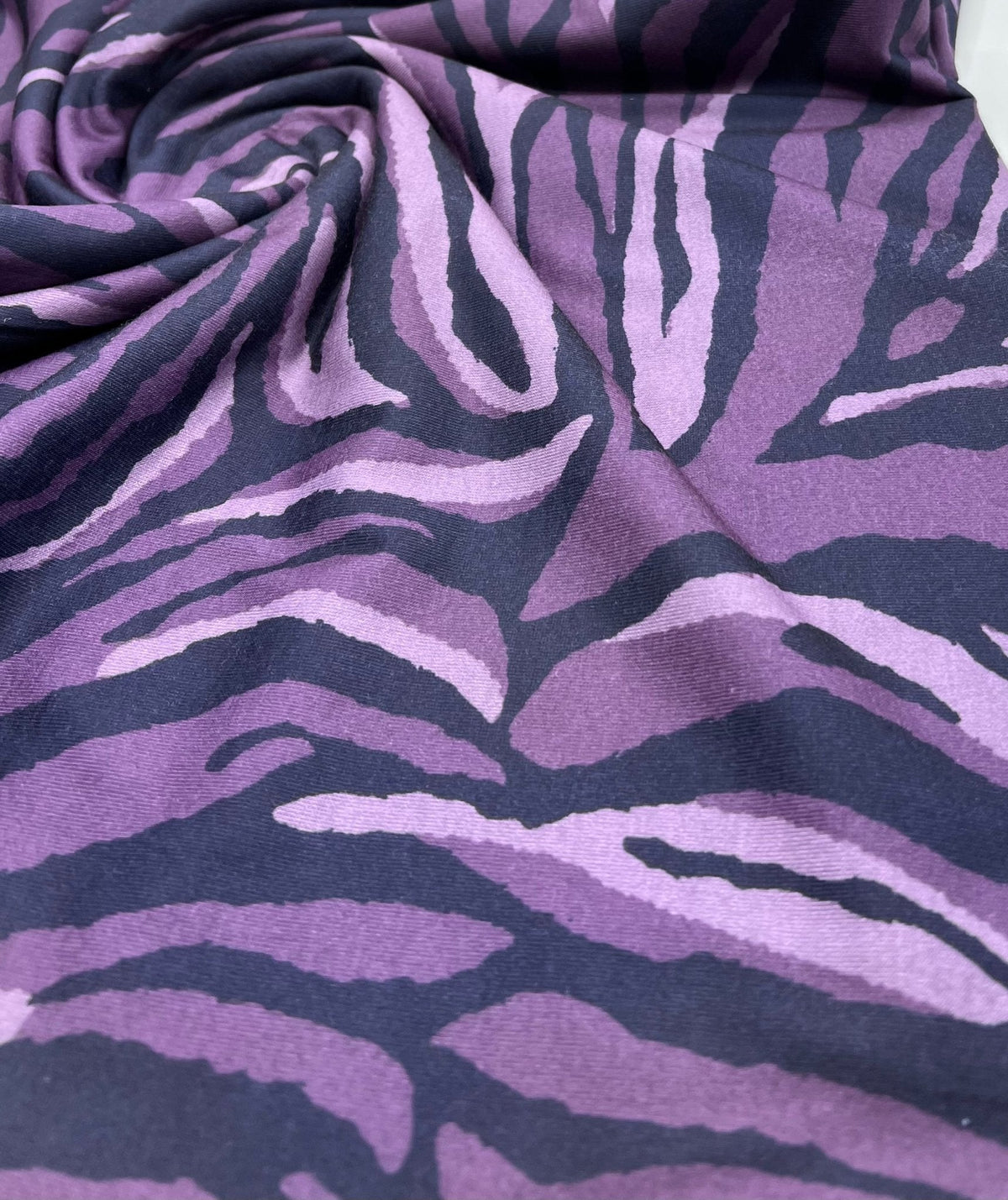 Purple Zebra Spun Poly Stretch Fabric
