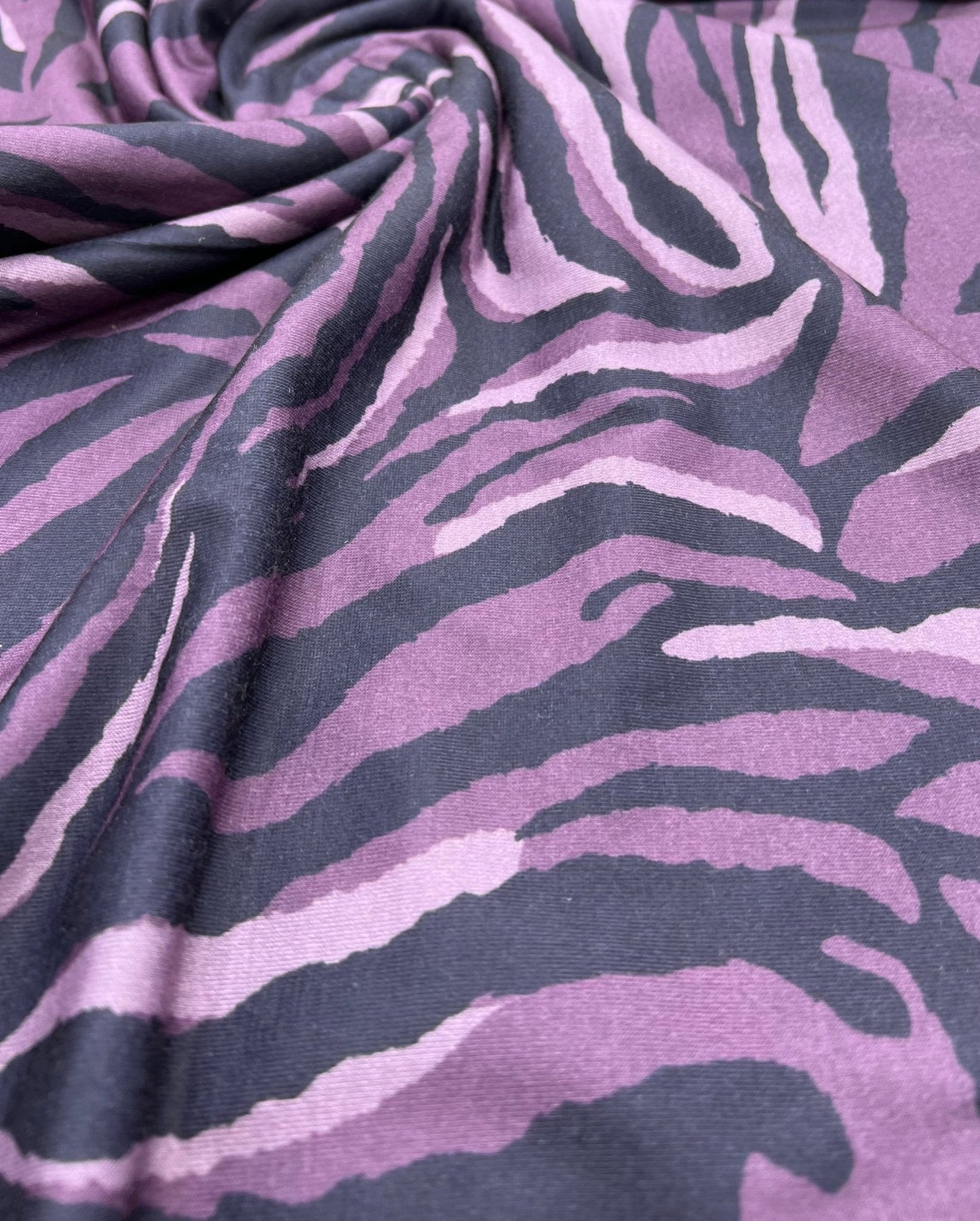 Purple Zebra Spun Poly Stretch Fabric