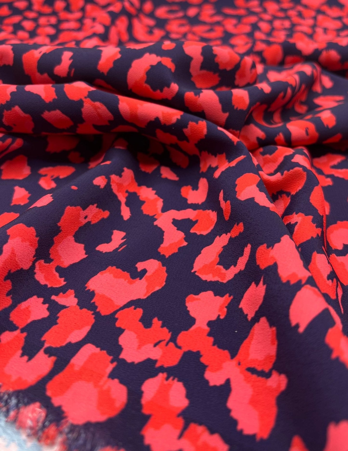 Red Animal Print Lightweight Bubble Crepe Fabric