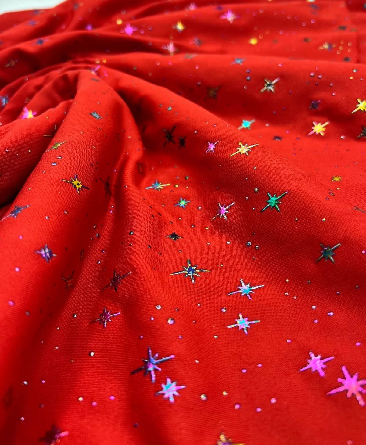 Red Multi Star Soft Spun Poly Stretch Fabric