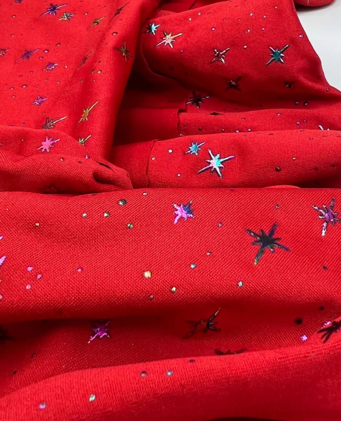 Red Multi Star Soft Spun Poly Stretch Fabric
