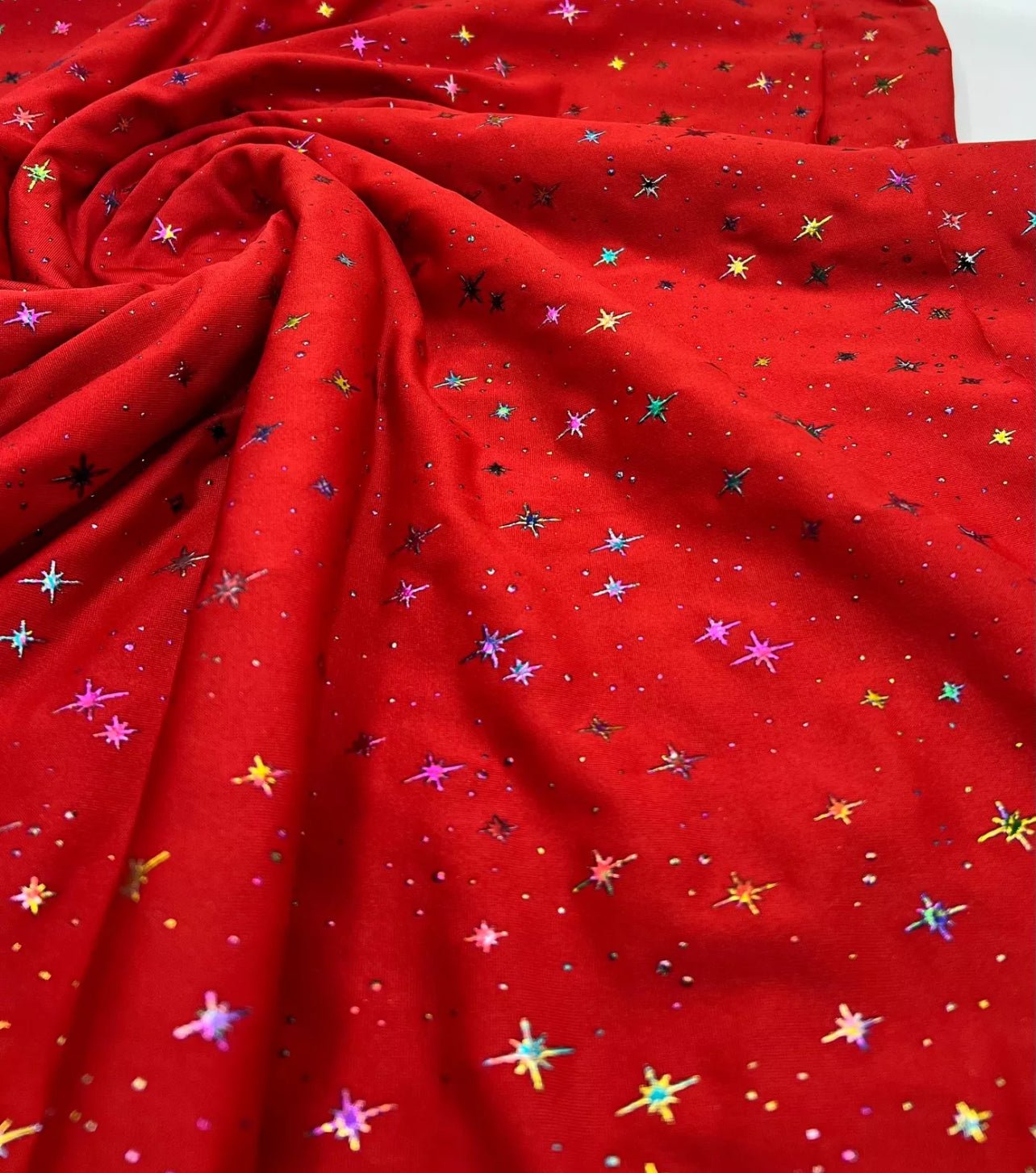 Red Multi Star Soft Spun Poly Stretch Fabric