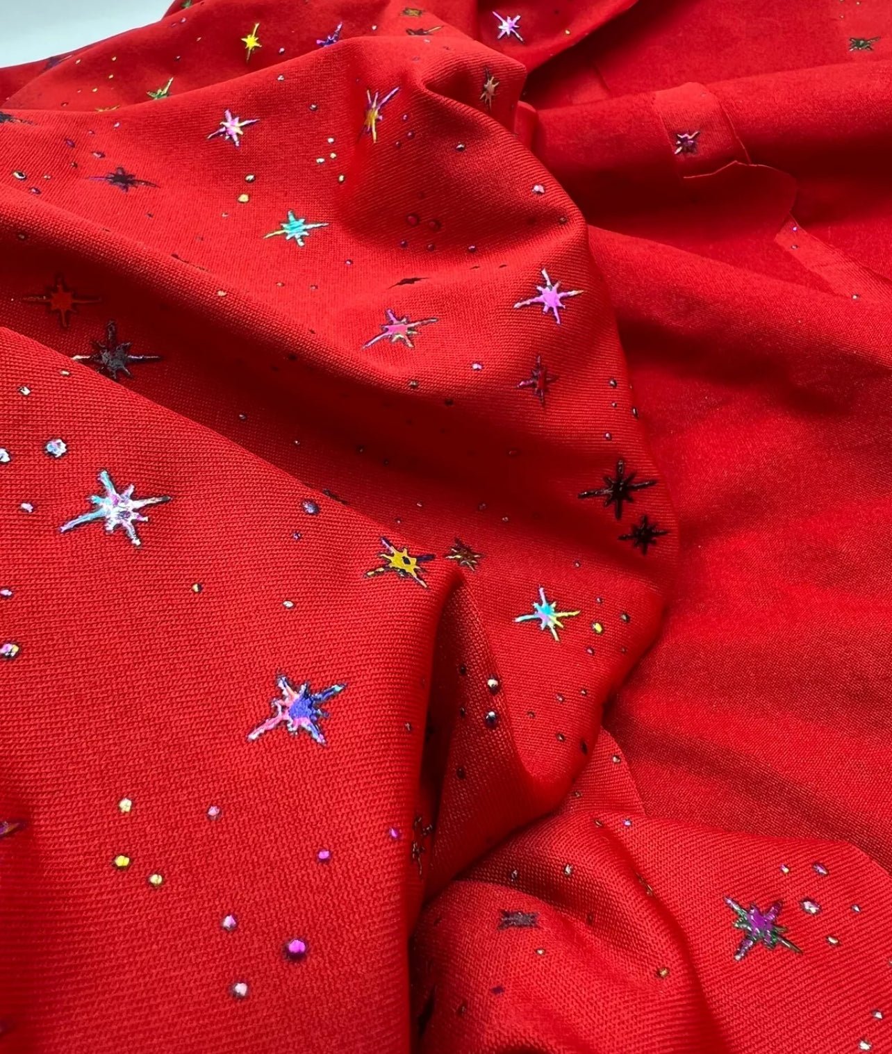 Red Multi Star Soft Spun Poly Stretch Fabric