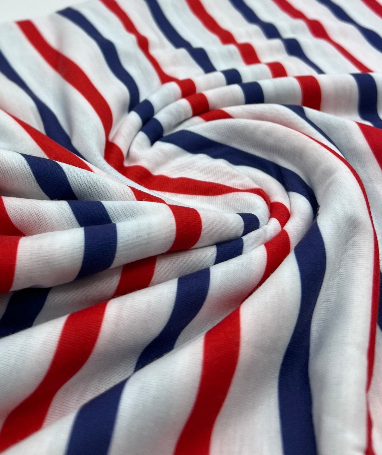 Red Navy Stripe Print Spun Poly Stretch Fabric