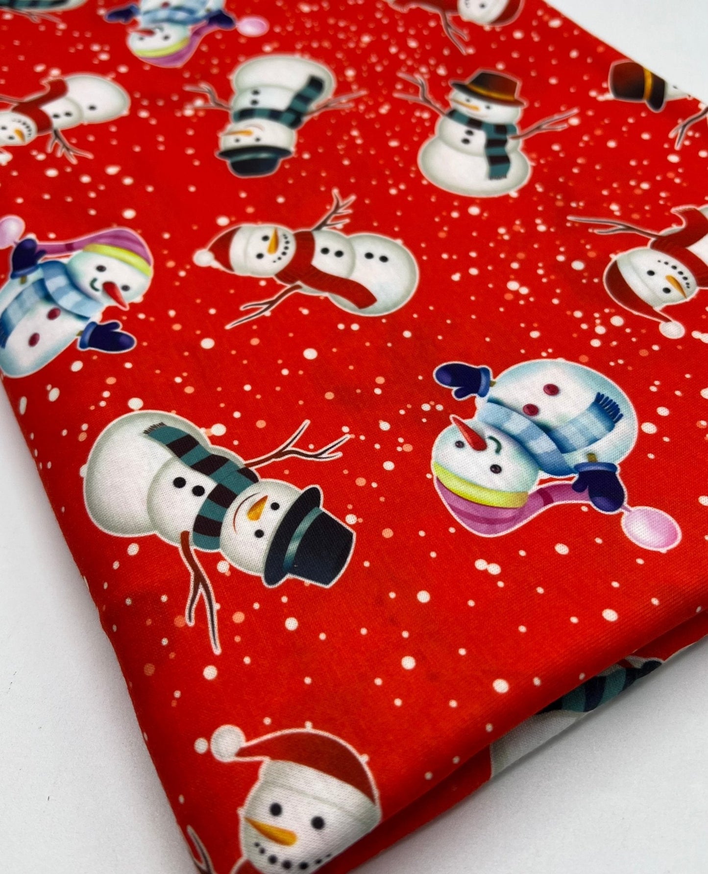 Red Snow Snowman Print Soft Spun Poly Stretch Fabric