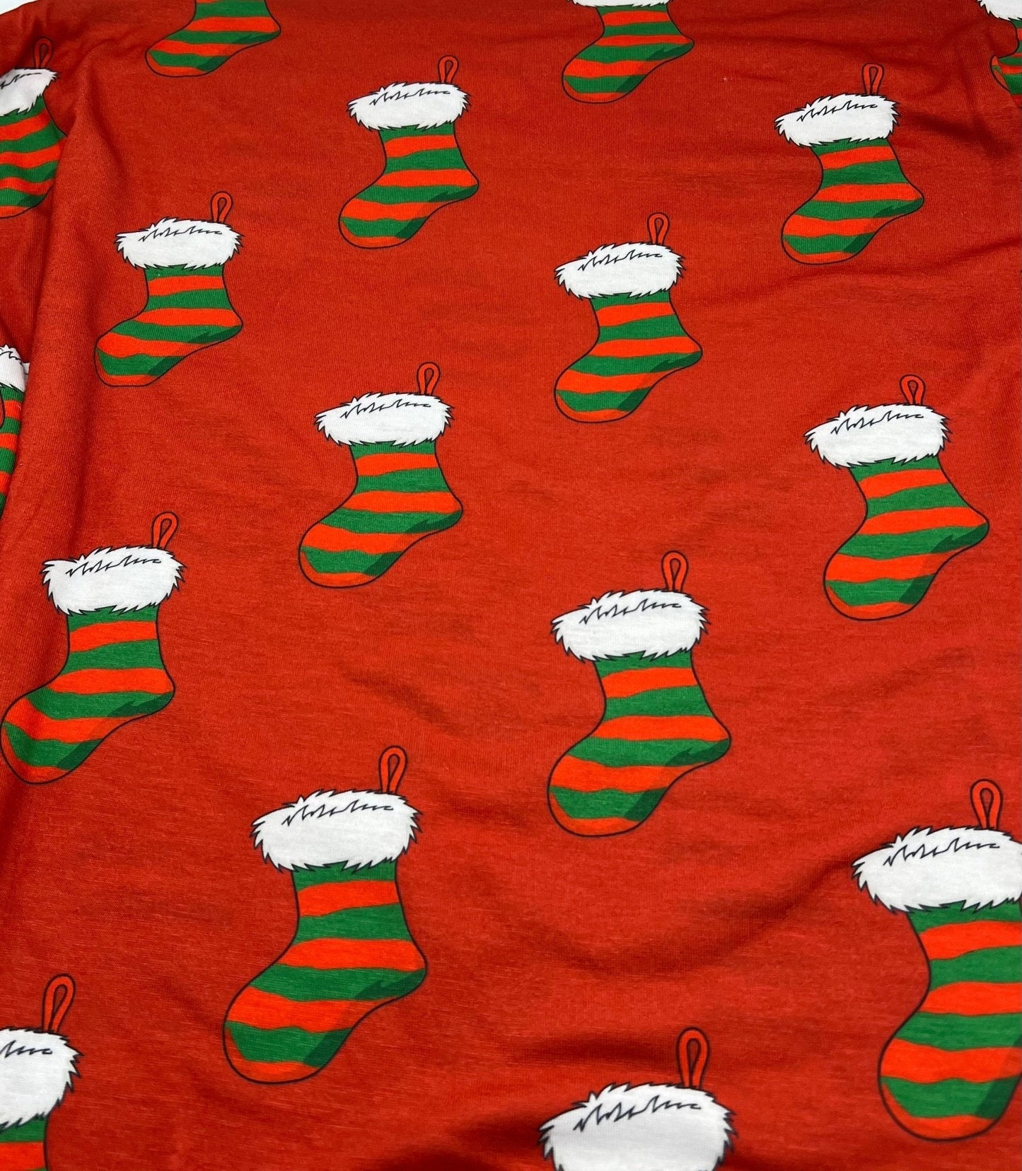 Red Stocking Print Soft Spun Poly Stretch Fabric