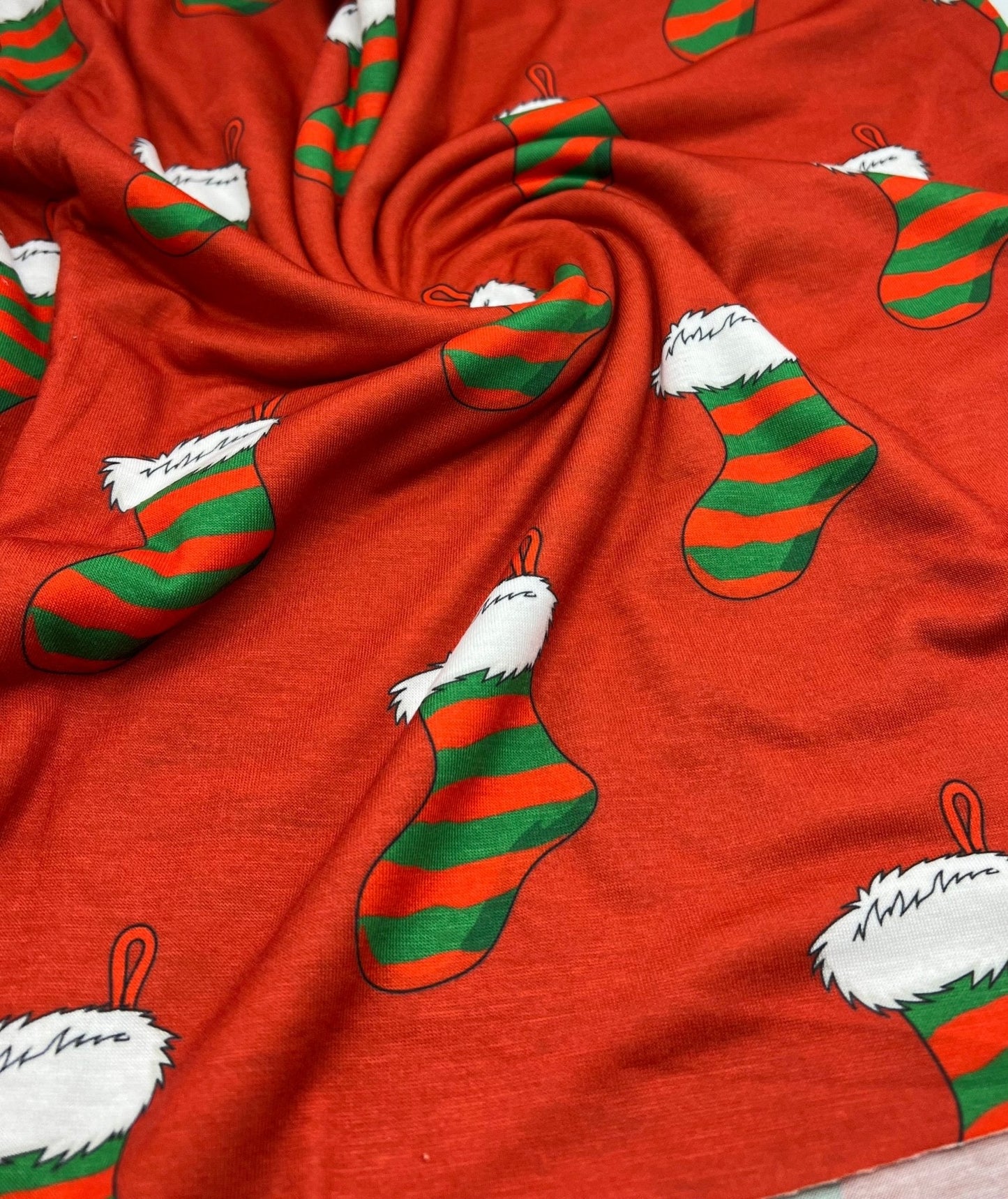 Red Stocking Print Soft Spun Poly Stretch Fabric