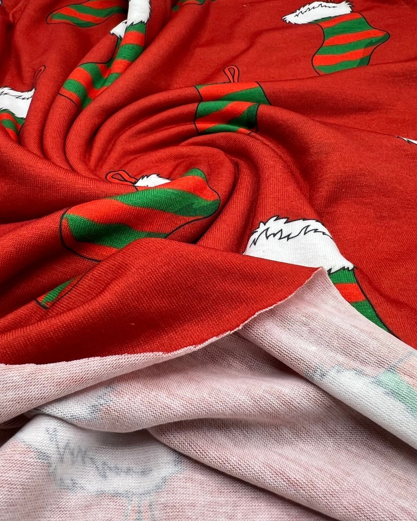 Red Stocking Print Soft Spun Poly Stretch Fabric