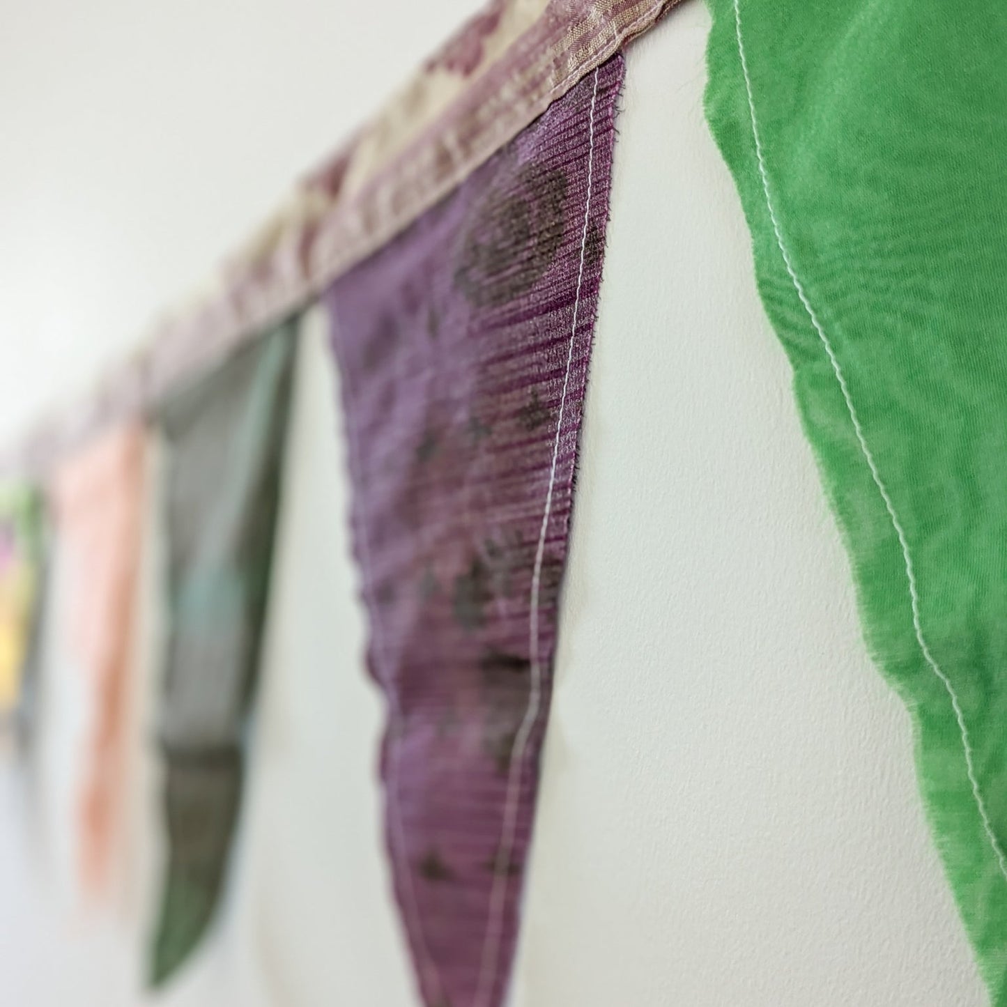Upcycled sari flags, reusable sari bunting