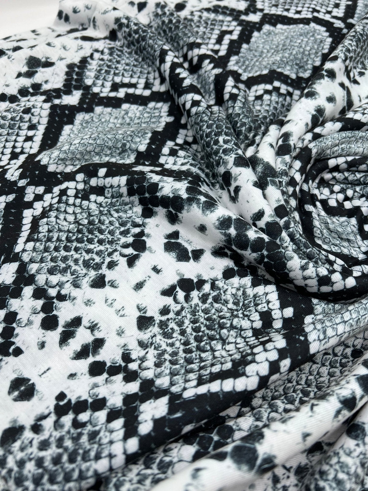Silver Grey Snake Print Spun Poly Stretch Fabric
