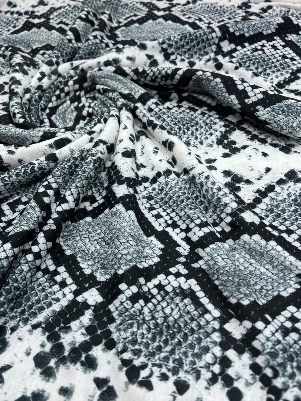 Silver Grey Snake Print Spun Poly Stretch Fabric