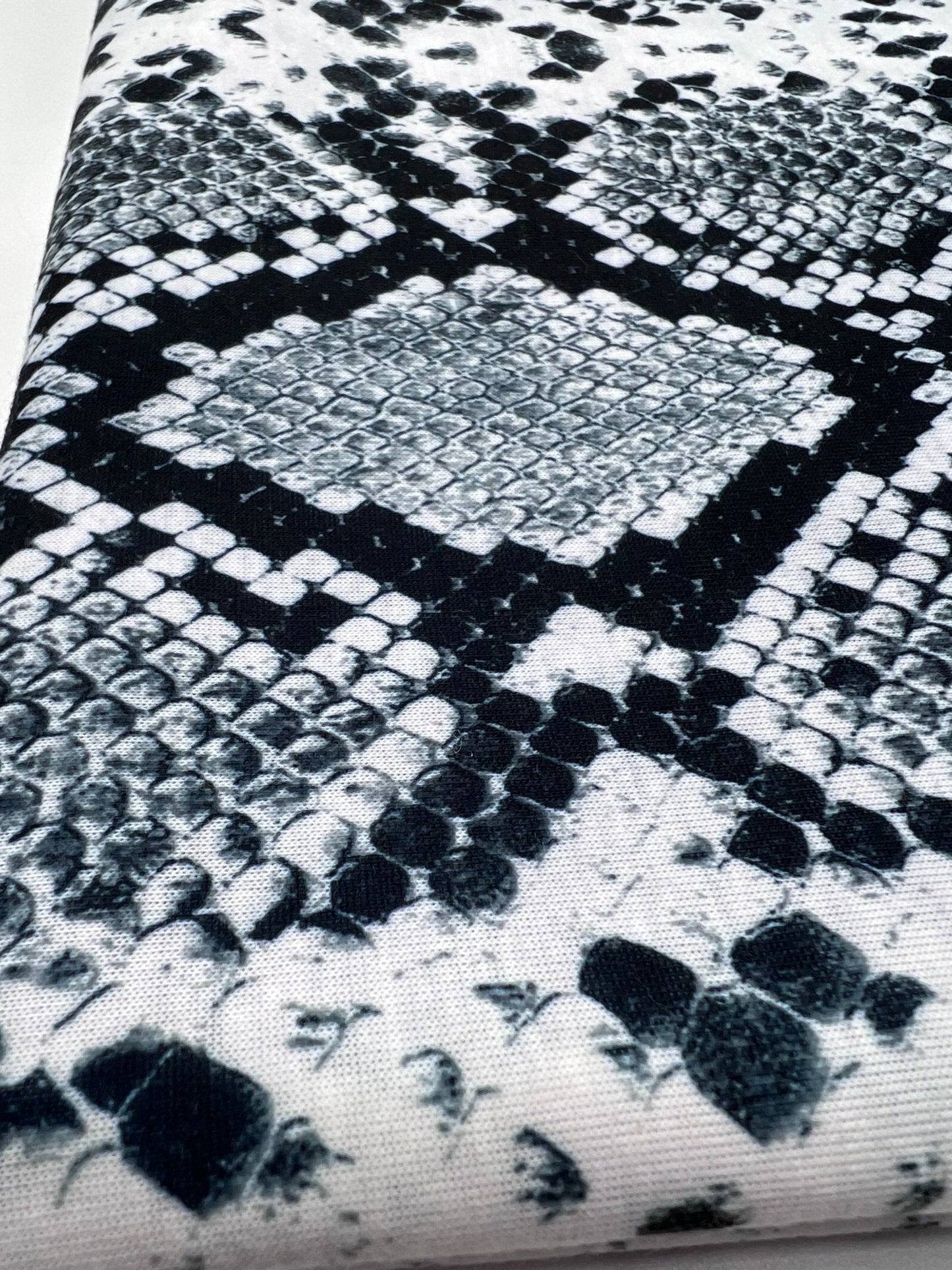 Silver Grey Snake Print Spun Poly Stretch Fabric