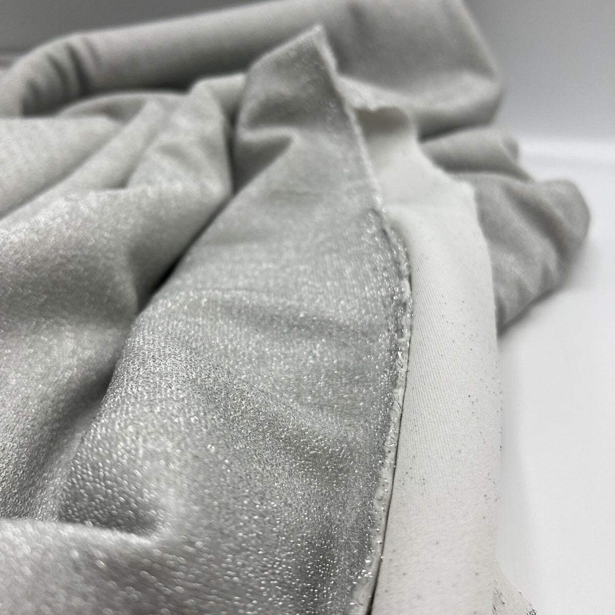 Silver Thread Detail Silver Lurex Sparkle Metallic Stretch Knit Fabric