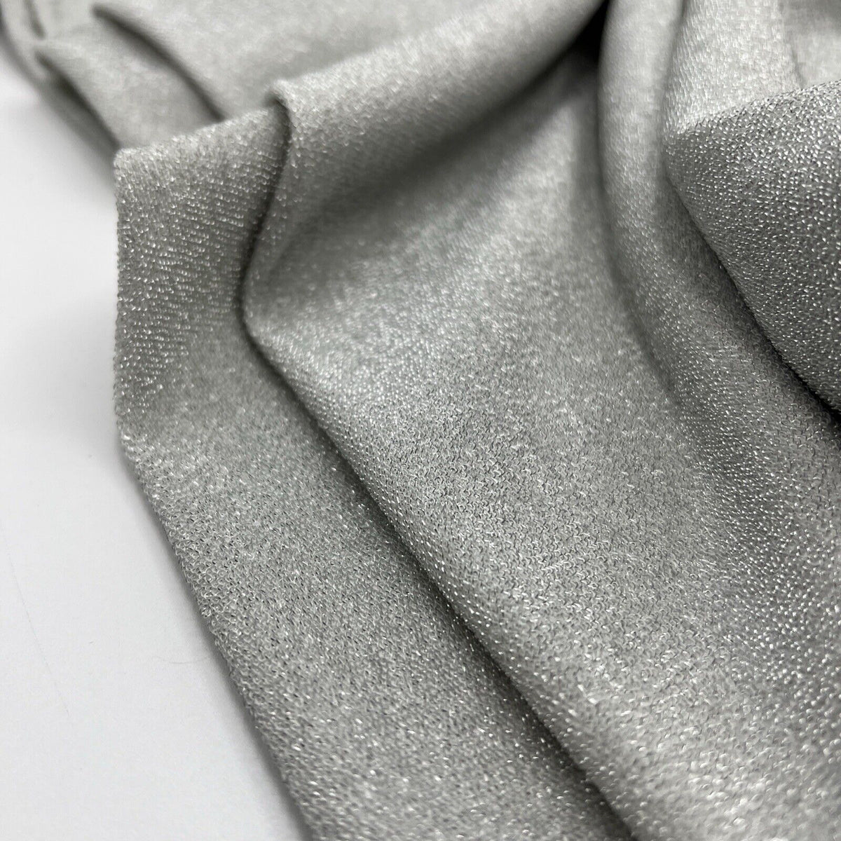 Silver Thread Detail Silver Lurex Sparkle Metallic Stretch Knit Fabric