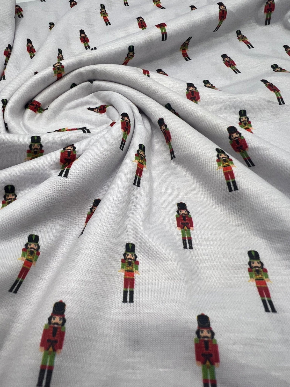 Small Nutcrackers Print Soft Spun Poly Stretch Fabric