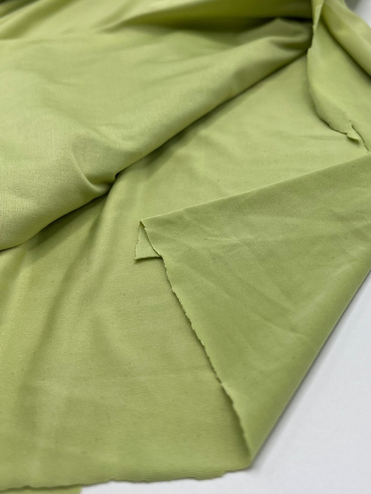 Soft Lime Green Plain Shiny Soft Touch Slinky 4 Way Stretch Fabric