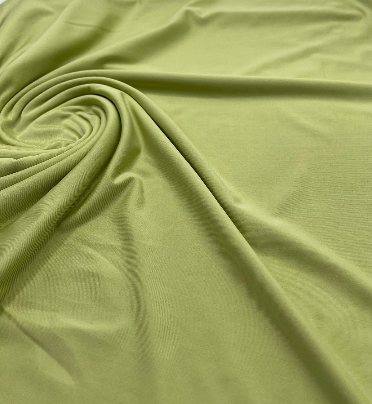 Soft Lime Green Plain Shiny Soft Touch Slinky 4 Way Stretch Fabric