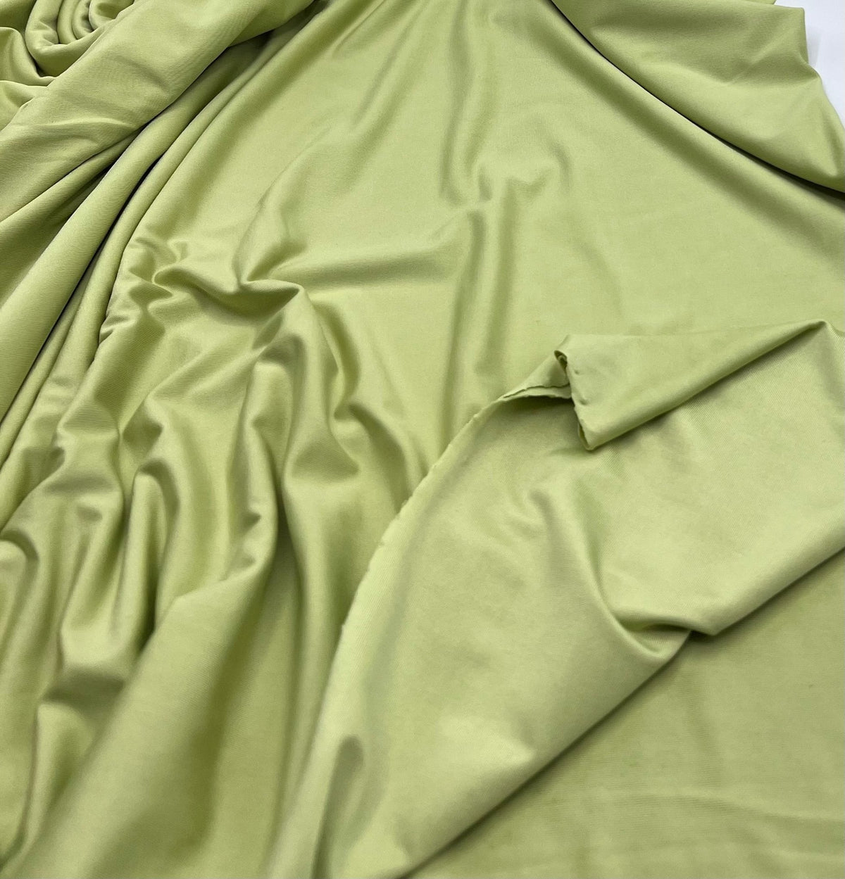 Soft Lime Green Plain Shiny Soft Touch Slinky 4 Way Stretch Fabric