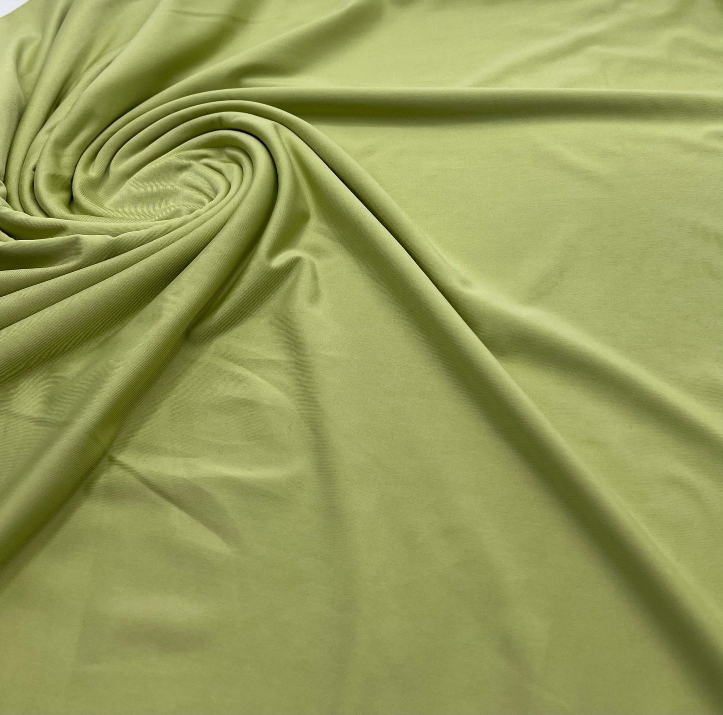 Soft Lime Green Plain Shiny Soft Touch Slinky 4 Way Stretch Fabric