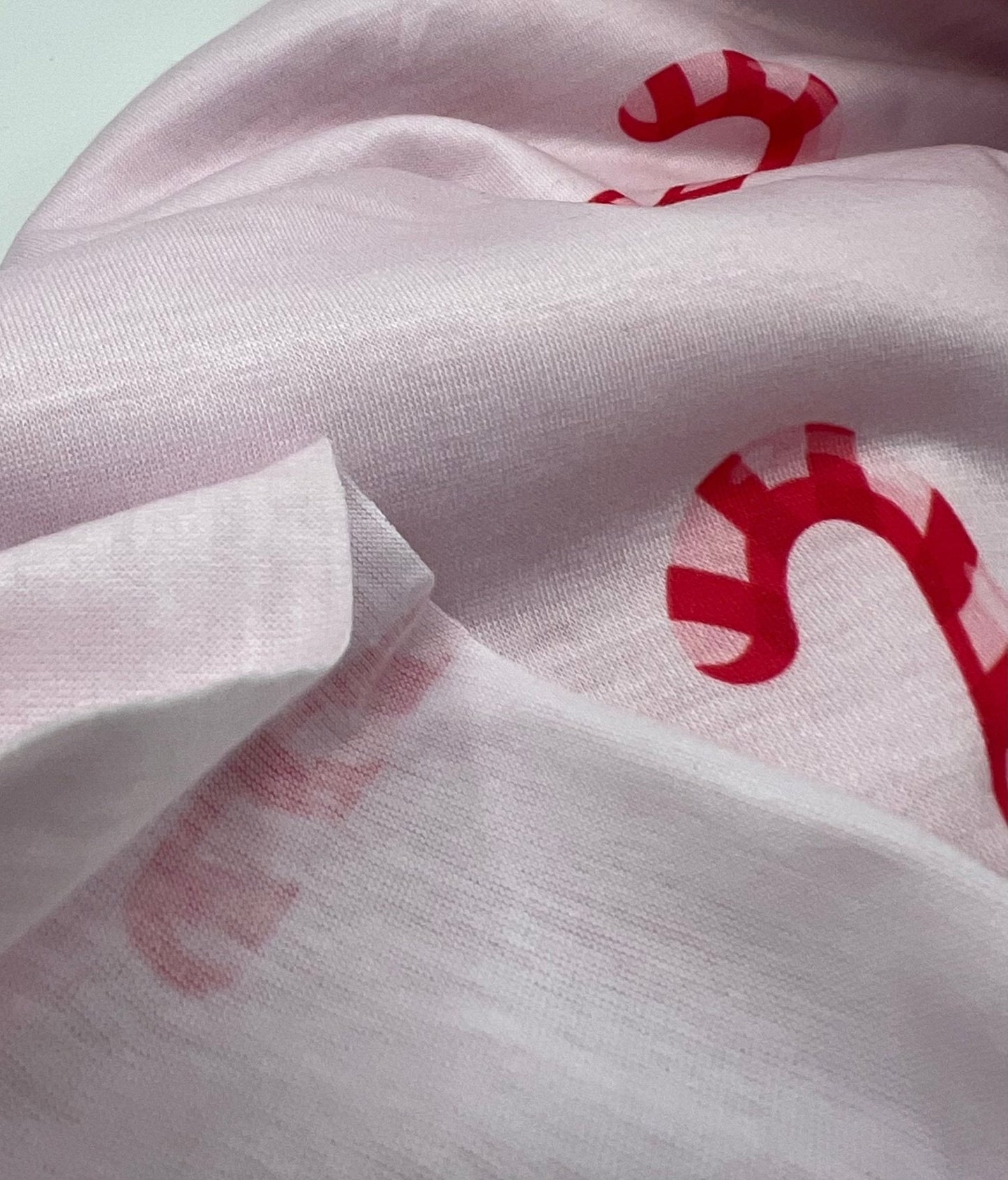 Soft Pink Candy Cane Print Soft Spun Poly Stretch Fabric