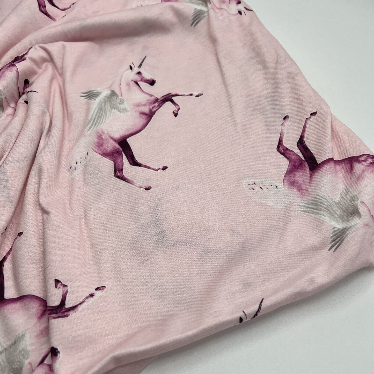 Soft Pink Unicorn Print Spun Poly Stretch Fabric