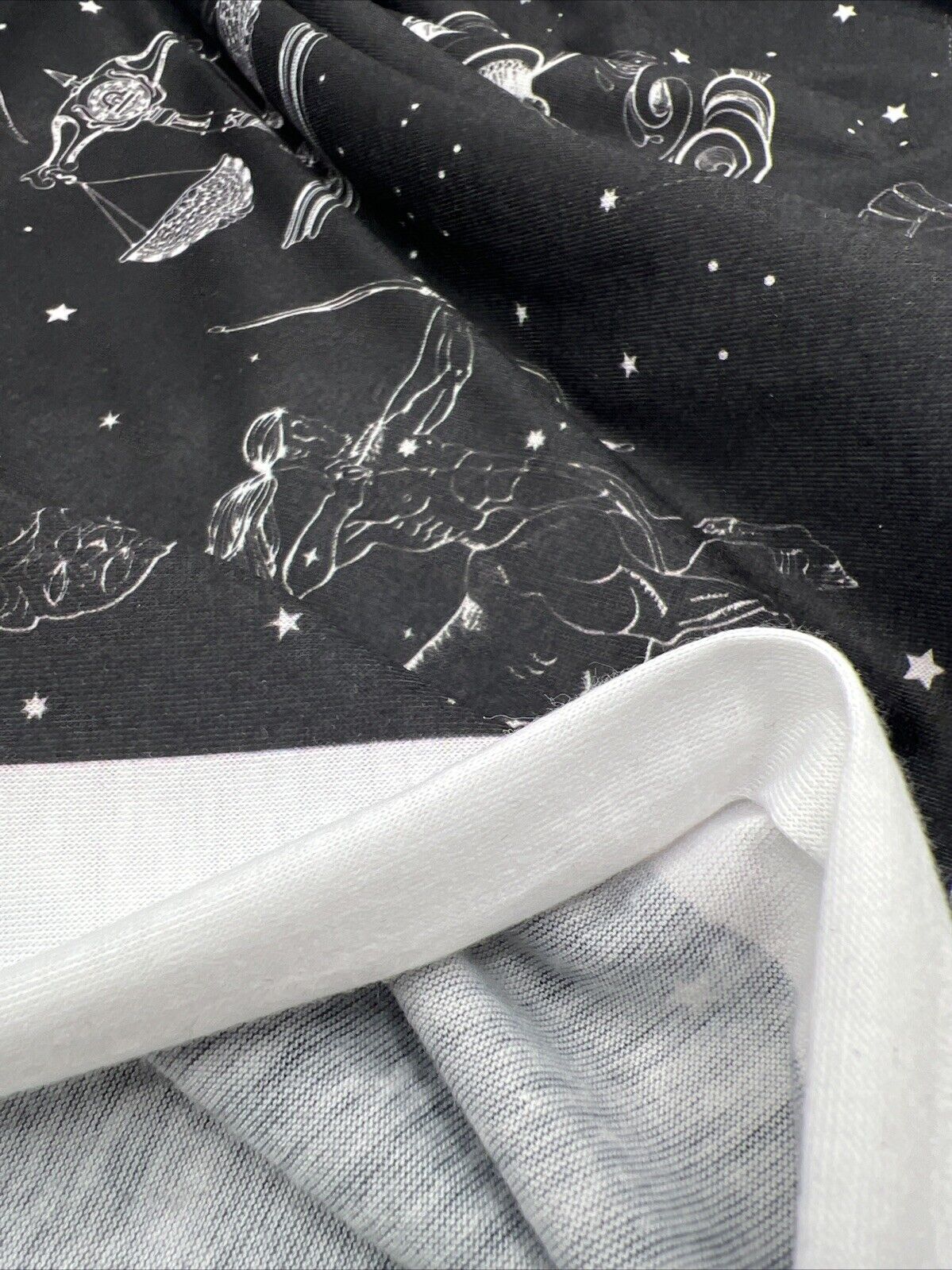 Star Sign Print Spun Poly Stretch Fabric