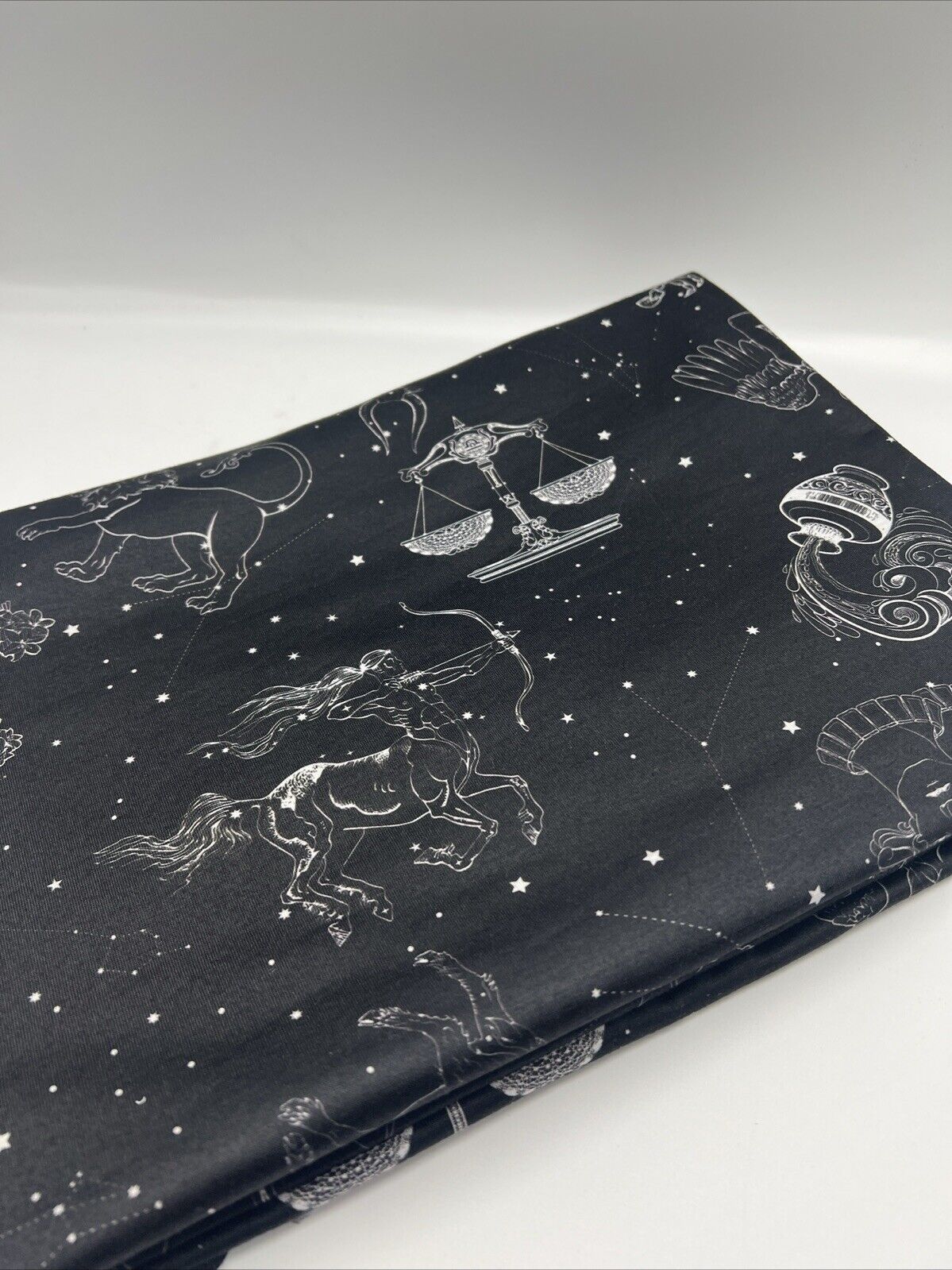 Star Sign Print Spun Poly Stretch Fabric