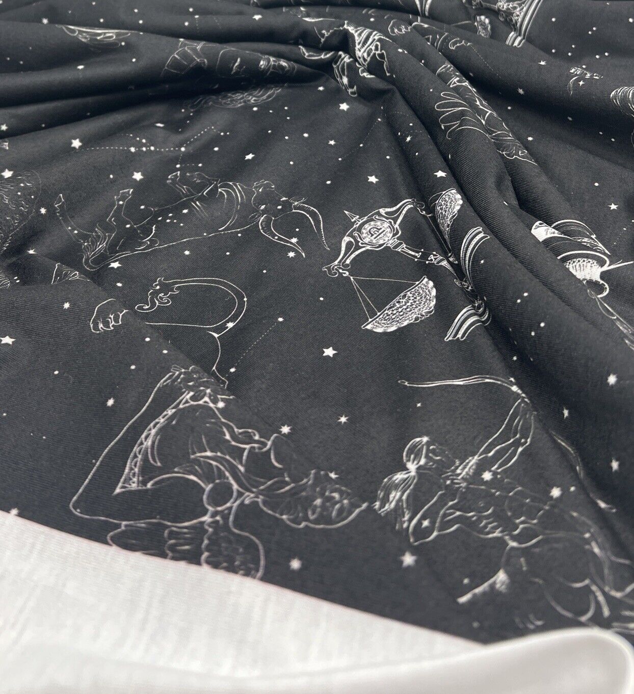 Star Sign Print Spun Poly Stretch Fabric