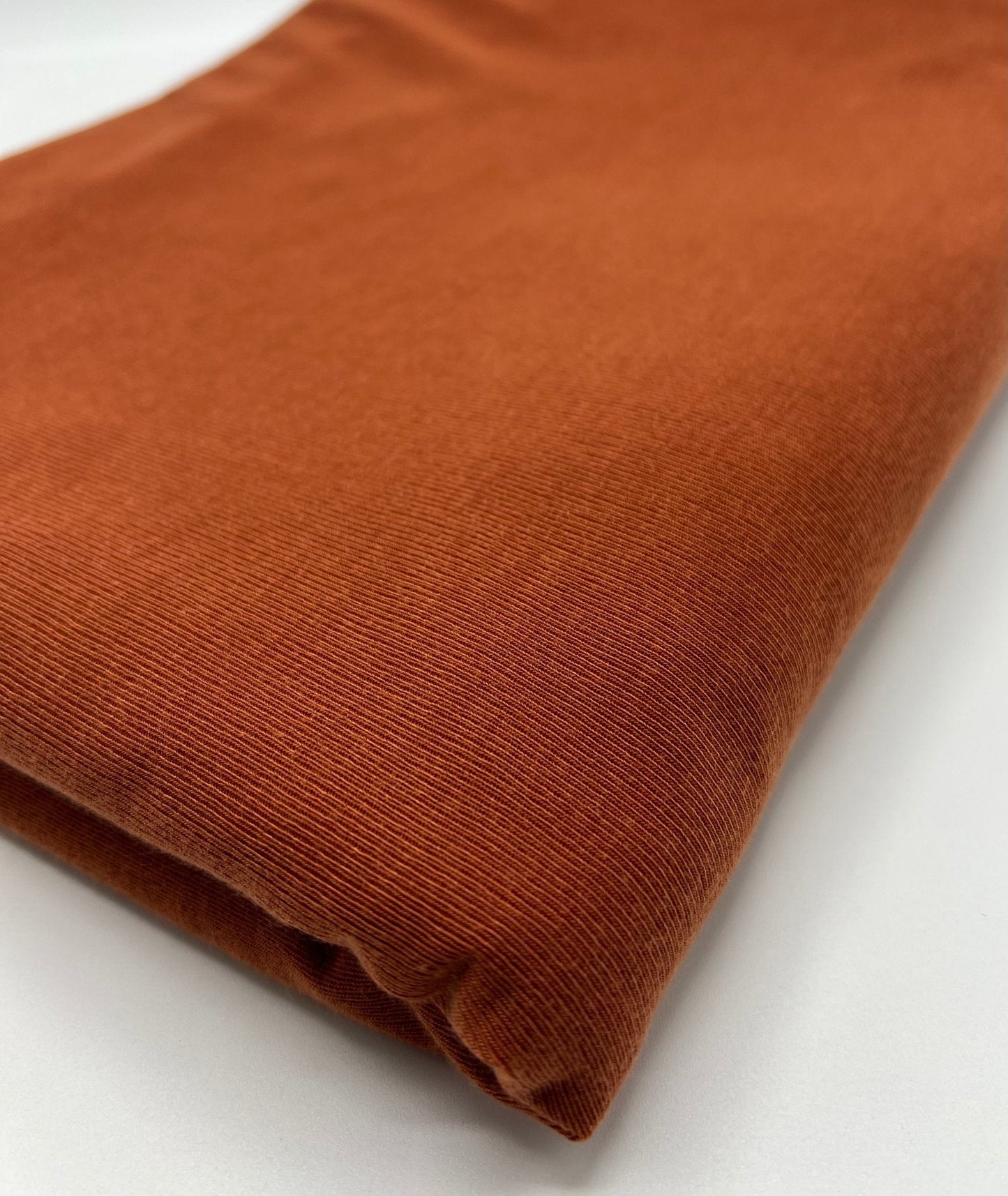 Terracotta Rust Lightweight Melange Knit Stretch Fabric