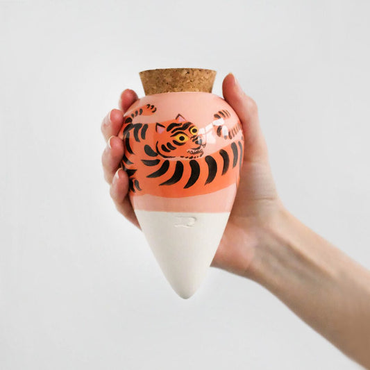 Pepin x Camille Gressier limited edition Tiger Olla with hand-painted orange tiger, held in the hand