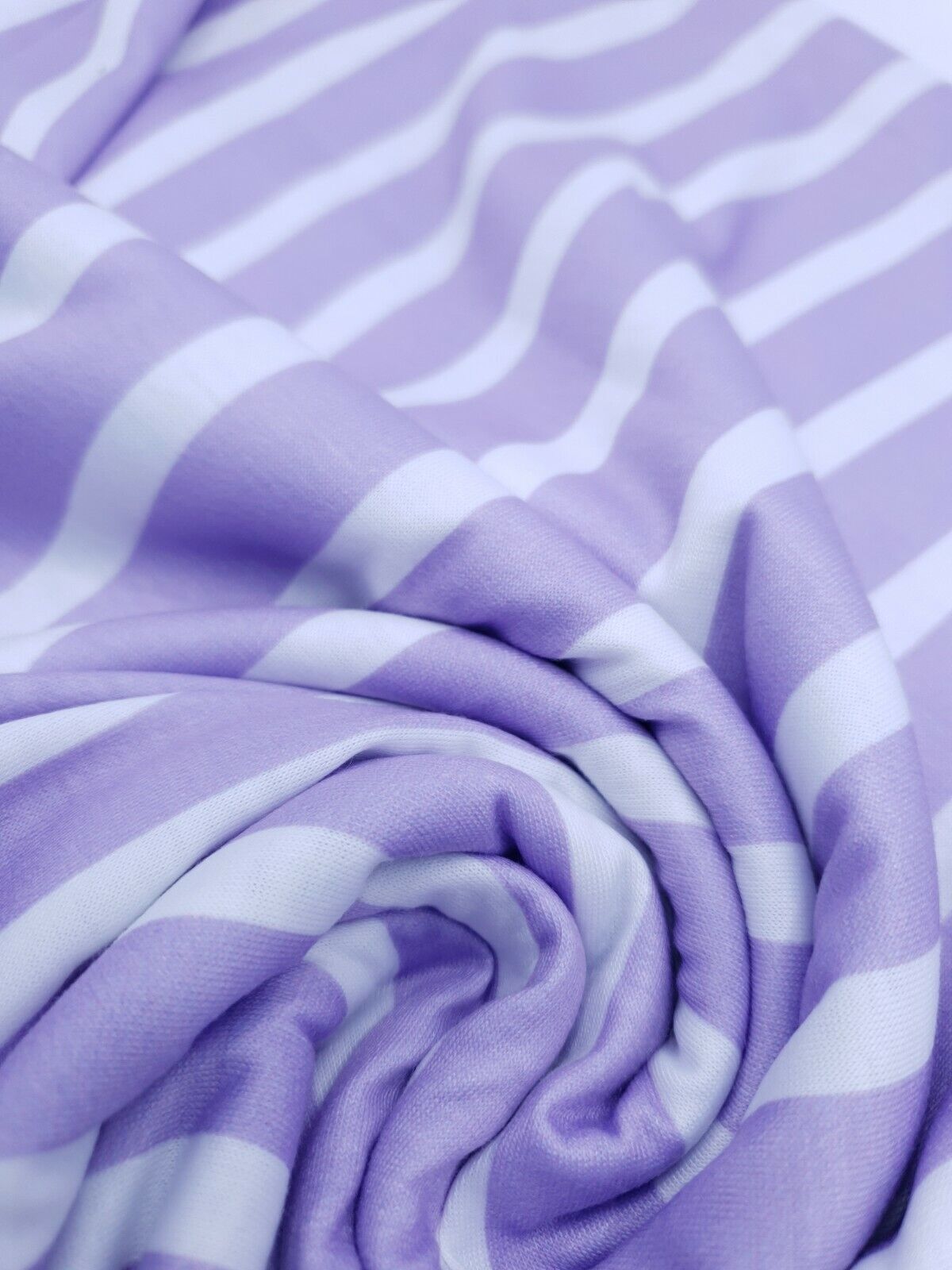 Vertical Stripe Lilac Print Spun Poly Stretch Fabric