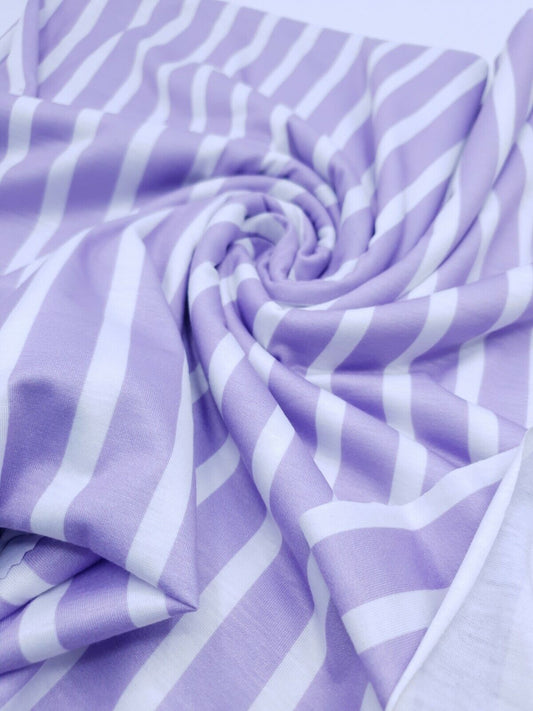 Vertical Stripe Lilac Print Spun Poly Stretch Fabric