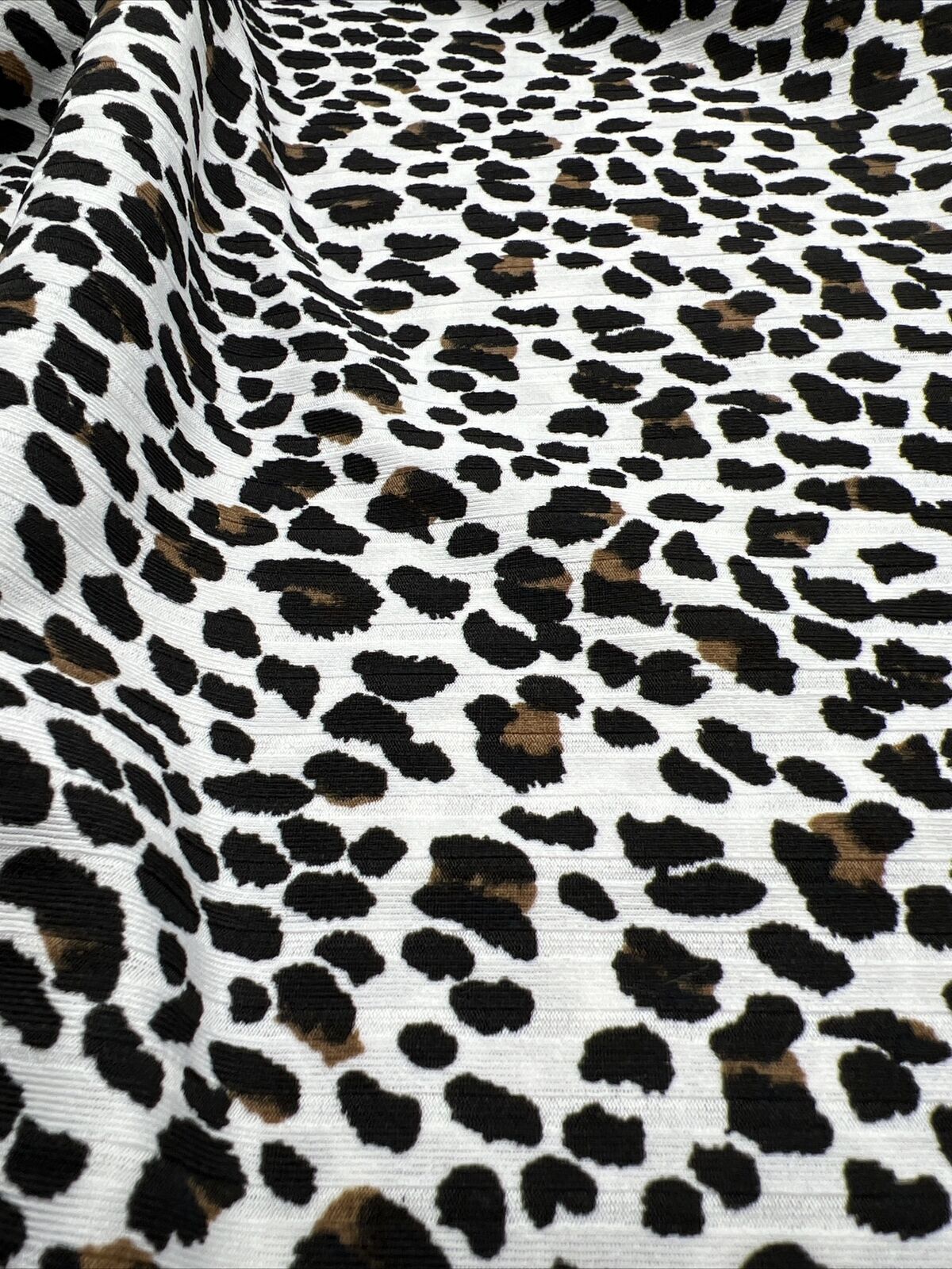 White Leopard Print 8x4 Wide Rib Stretch Fabric