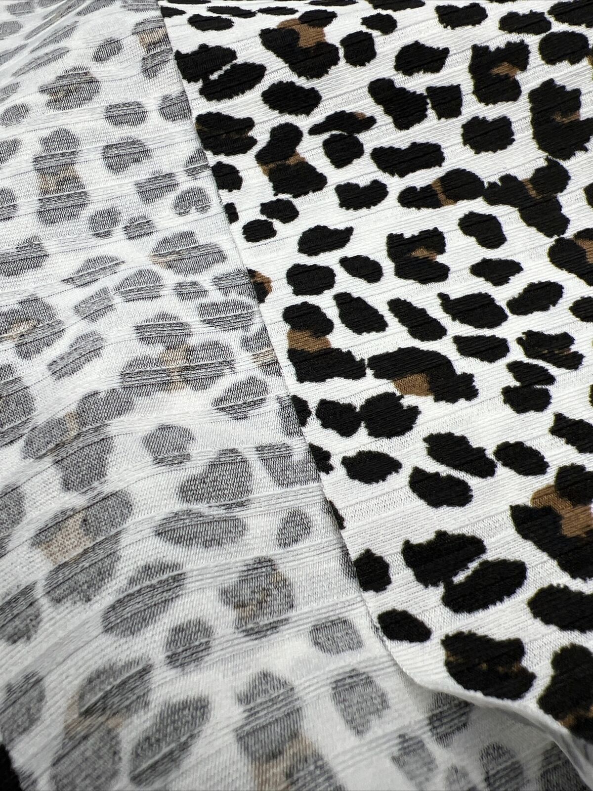 White Leopard Print 8x4 Wide Rib Stretch Fabric