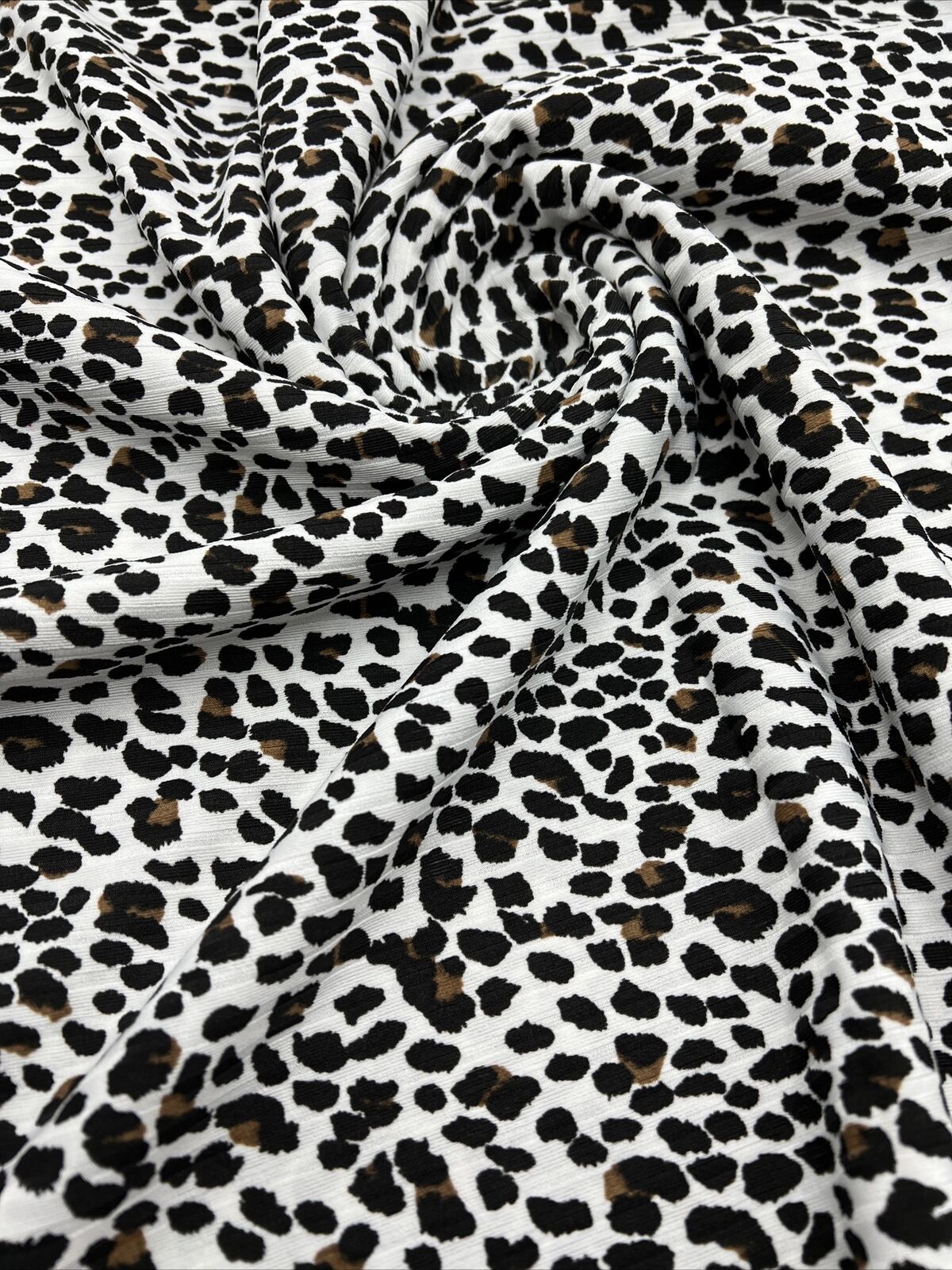 White Leopard Print 8x4 Wide Rib Stretch Fabric