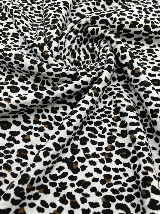 White Leopard Print 8x4 Wide Rib Stretch Fabric