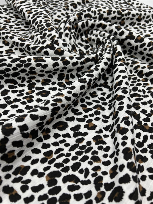 White Leopard Print 8x4 Wide Rib Stretch Fabric