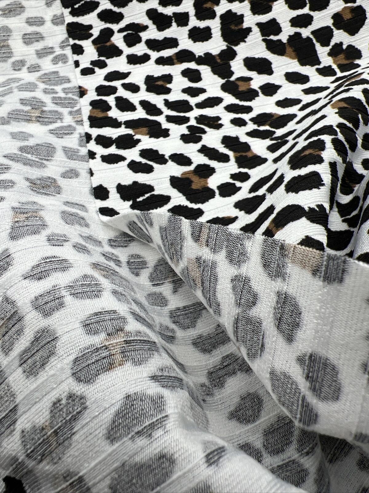 White Leopard Print 8x4 Wide Rib Stretch Fabric