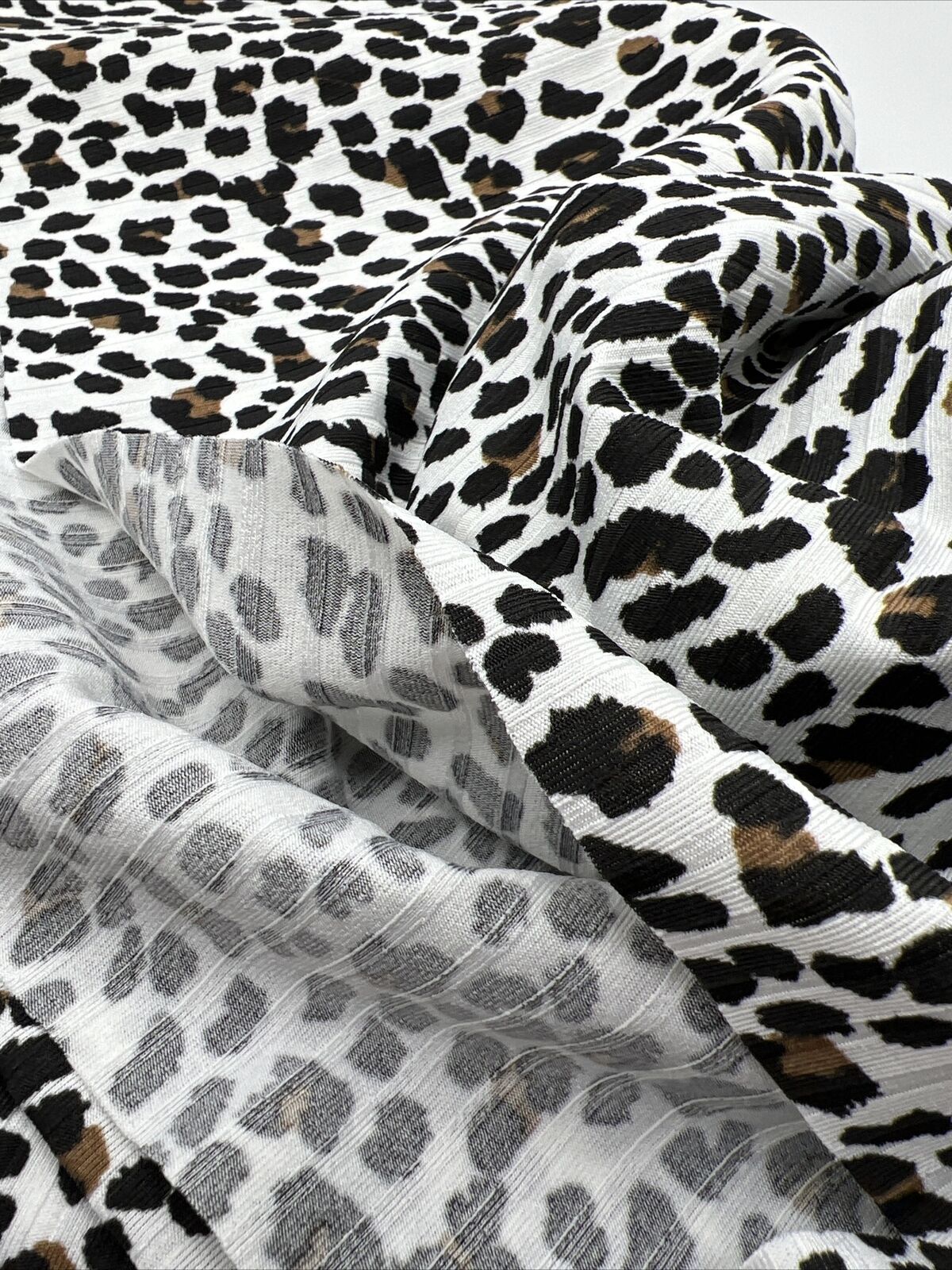 White Leopard Print 8x4 Wide Rib Stretch Fabric