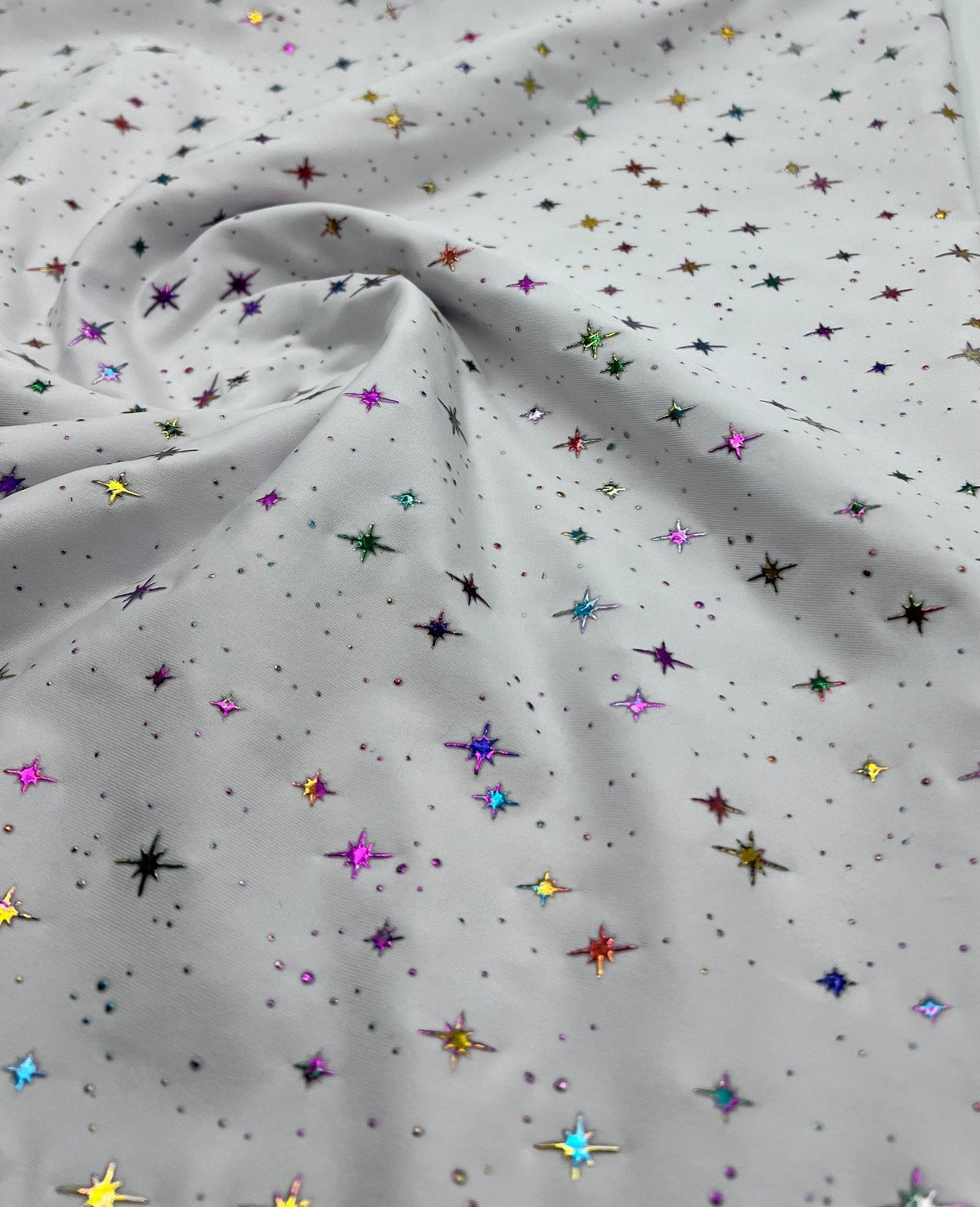 White Multi Star Soft Spun Poly Stretch Fabric