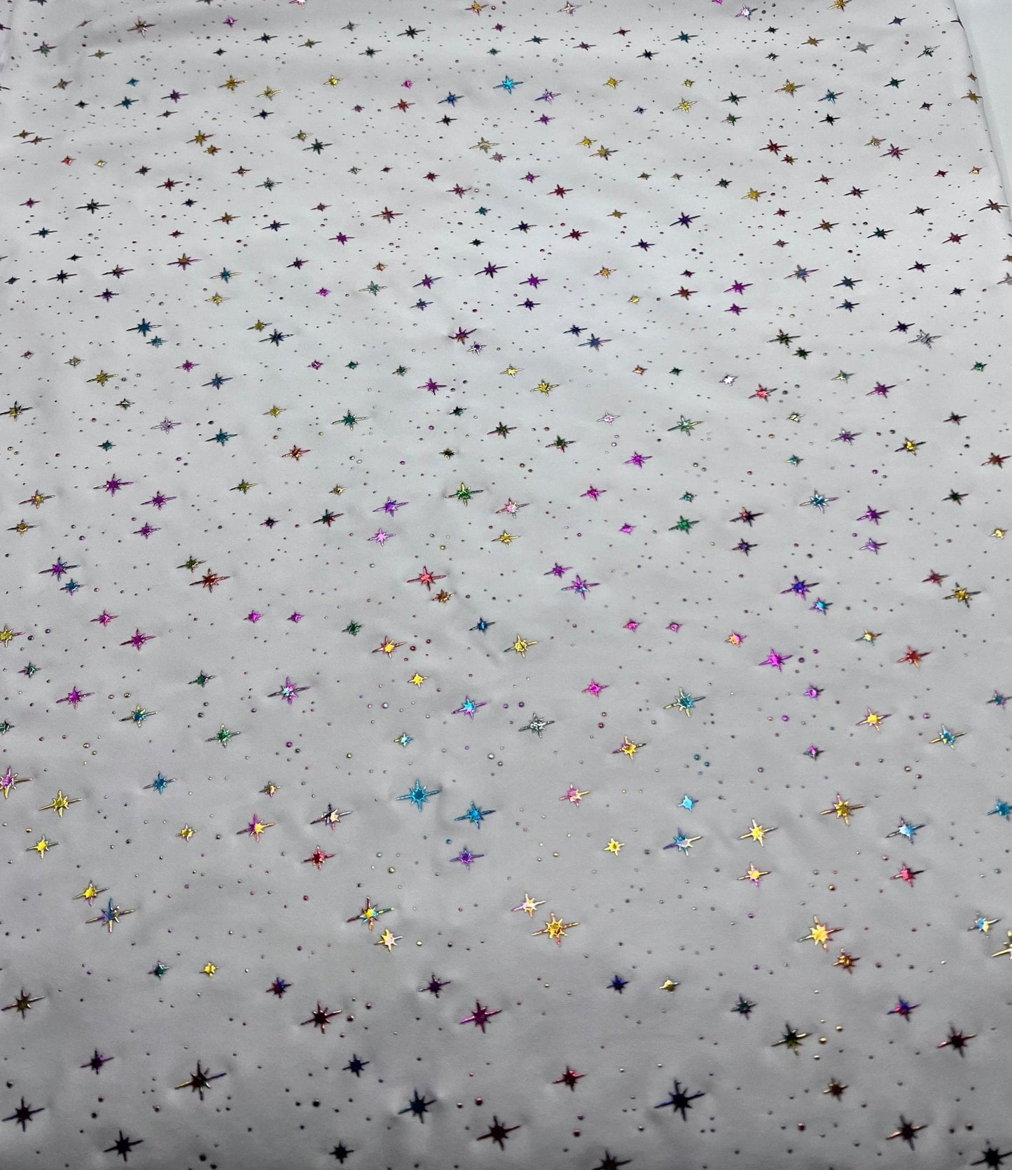 White Multi Star Soft Spun Poly Stretch Fabric