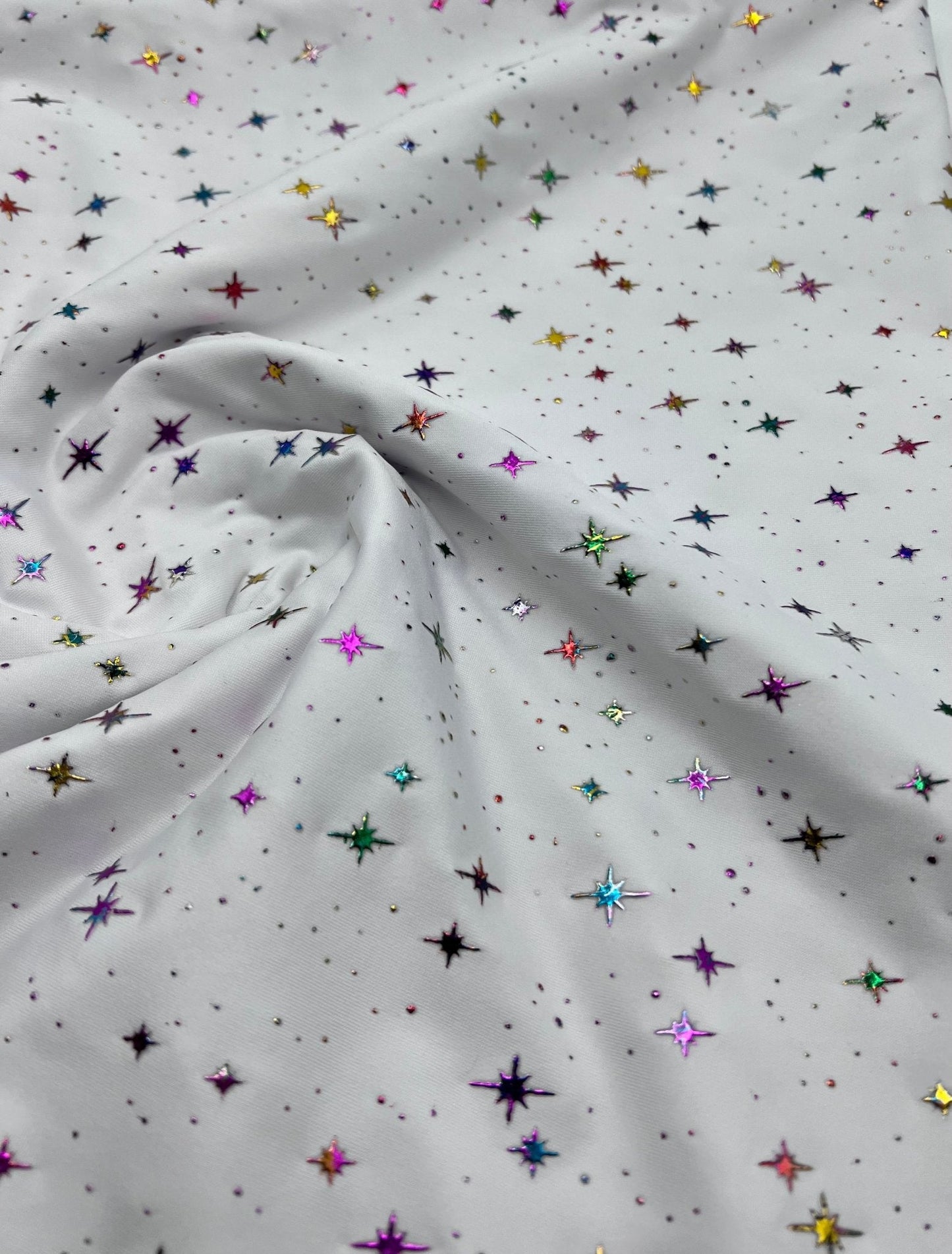 White Multi Star Soft Spun Poly Stretch Fabric