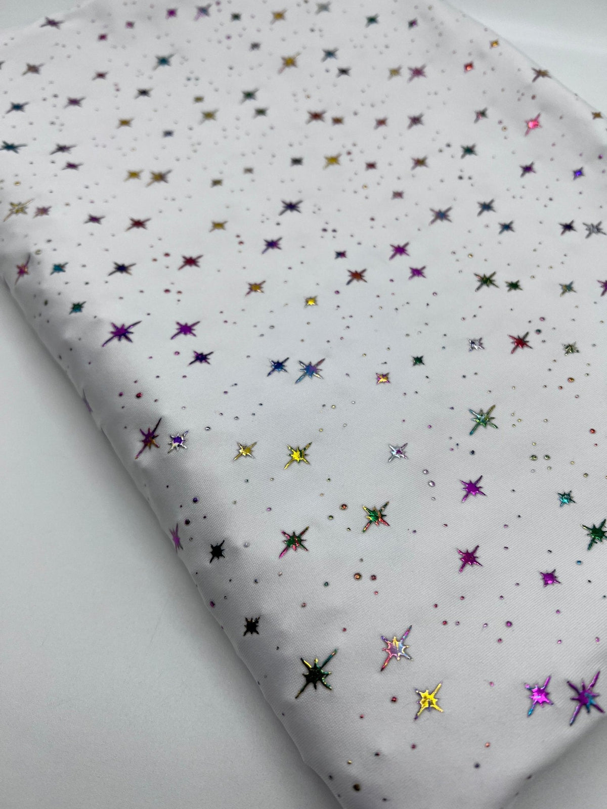 White Multi Star Soft Spun Poly Stretch Fabric